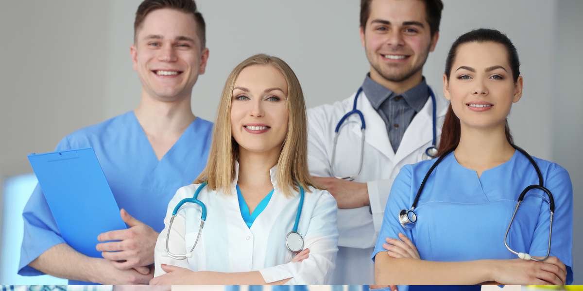 Healthcare professionals smiling together, representing career opportunities after earning a Health and Social Care Degree.